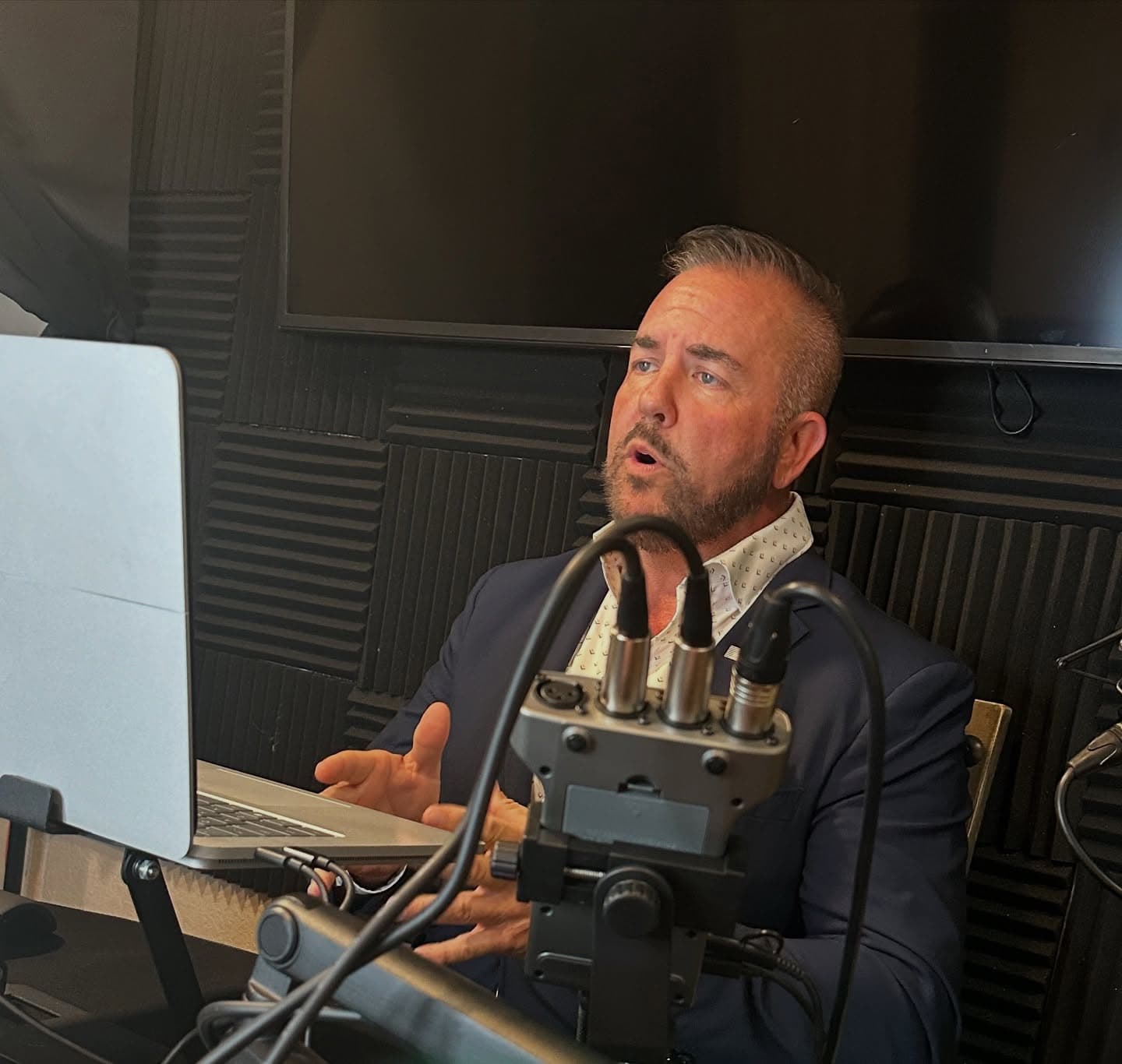 Guy Beveridge recording a podcast